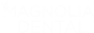 Logo of Magnolia Dental with the text in white capital letters. A stylized tooth appears on the left side of Magnolia, showcasing a sleek, modern aesthetic that feels right at home in web design for a digital marketing agency.