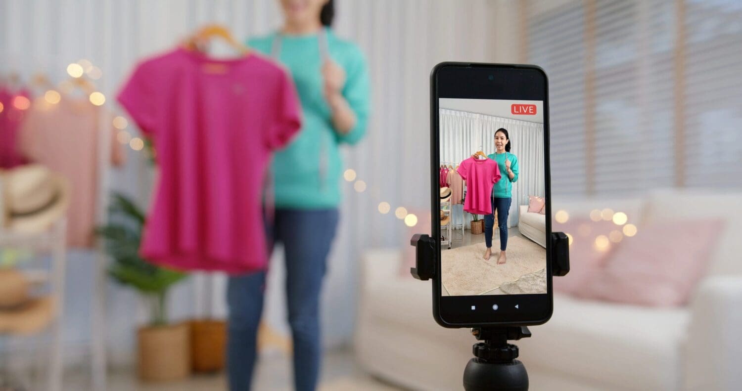 business owner using social media marketing to sell products online