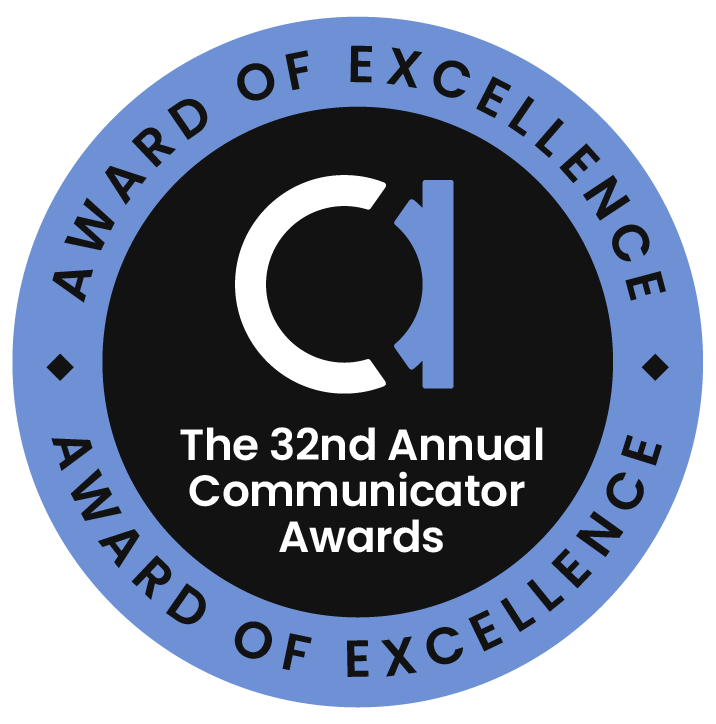 A round blue and black badge reads Award of Excellence around the edge and The 32nd Annual Communicator Awards with a stylized CA logo in the center.